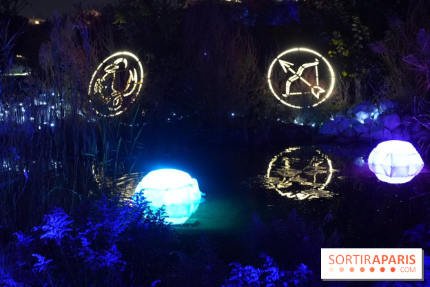 Parc de l'Étrange 2026 : Figures lumineuses circulaires au bord de l’étang