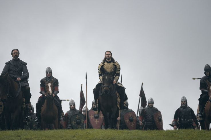 Bloodaxe - Chevalier en armure dorée au centre d'une formation de guerriers montés