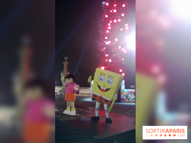 Inauguration du plus grand sapin d'Europe à Paris, place de la Concorde, Dora et Bob l'éponde