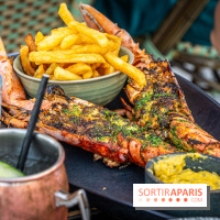 Le restaurant - terrasse Quai Ouest en mode estivale avec ses Dîners Braséro