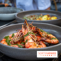 Le restaurant - terrasse Quai Ouest en mode estivale avec ses Dîners Braséro