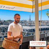 La terrasse estivale du Printemps Haussmann 2025 avec vue sur Paris et la Tour Eiffel