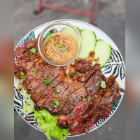 SEP LAÏ à Paris : aperçu des spécialités laotiennes proposées à la carte - Notre larme du tigre   on sait que vous l’adorez, alors on se permet 🐯