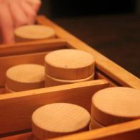 Shuffled : l'enseigne de shuffleboard à Boom Boom Villette