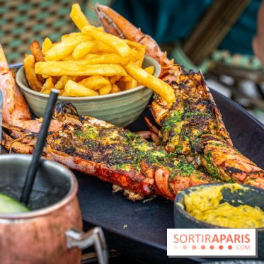 Le restaurant - terrasse Quai Ouest en mode estivale avec ses Dîners Braséro