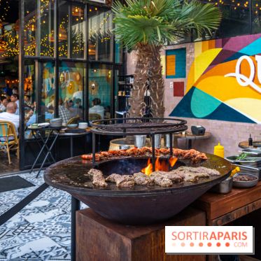 Le restaurant - terrasse Quai Ouest en mode estivale avec ses Dîners Braséro