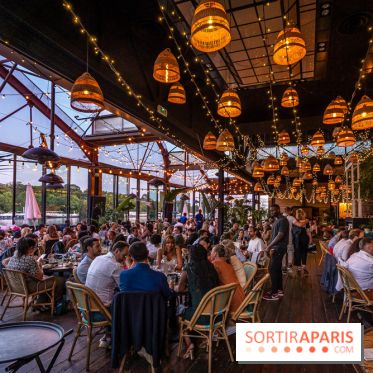 Le restaurant - terrasse Quai Ouest en mode estivale avec ses Dîners Braséro
