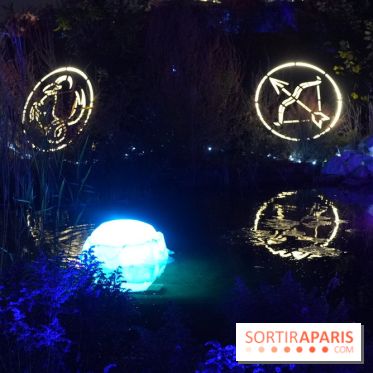 Parc de l'Étrange 2026 : Figures lumineuses circulaires au bord de l’étang
