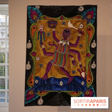 Aux frontières de l'imaginaire : Divinité multibras sur fond doré