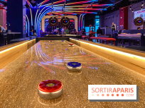 Shuffled, l'enseigne de shuffleboard à Boom Boom Villette