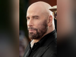 John Travolta, interprète de Jack Stanton dans Primary Colors