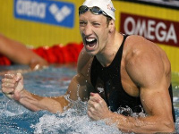 France's Alain Bernard celebrates as he realises he set a new world record for the men's 100 metres freestyle in a time of 47.60sec in the semifinals of the 29th LEN European Swimming Championships, on March 21, 2008 in Eindhoven.  AFP PHOTO / JOHN THYS