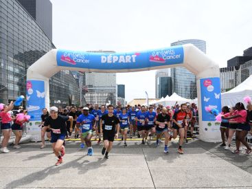 La course solidaire Enfants sans Cancer City par Imagine Margo à La Défense