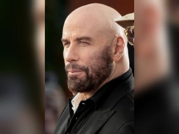 John Travolta, interprète de Jack Stanton dans Primary Colors