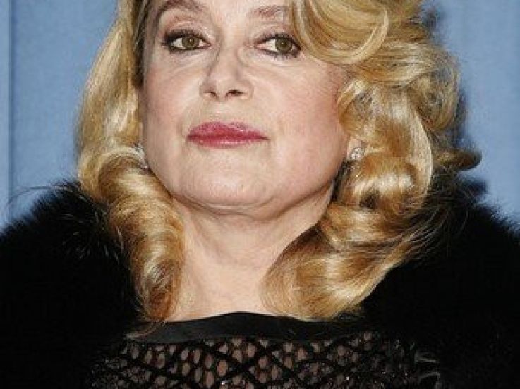 PARIS - DECEMBER 18:  French actress Catherine Deneuve attends the premiere of "Le Heros de la Famille" at the UGC Normandie on December 18, 2006 in Paris, France.  (Photo by Francois Durand/Getty Images) *** Local Caption *** Catherine Deneuve