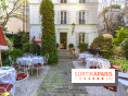 Terrasse de l'Hôtel Particulier, le jardin verdoyant au cœur de Montmartre - photo