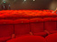 Visuels salles de spectacle et théâtres - salle de cinéma fauteuil rouge