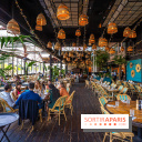 Le restaurant - terrasse Quai Ouest en mode estivale avec ses Dîners Braséro