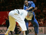 Lucie Decosse (R) of France vies with Urska Zolhir (L) of Slovenia in the women's 63 kg final final of the Euro Judo Championship in Belgrade, 07 April 2007.Decosse  won the final.        (Photo credit should read DIMITAR DILKOFF/AFP/Getty Images)