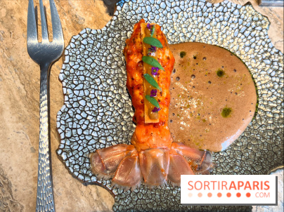 Restaurant Alan Geaam - La Langoustine Royale Cuite au BBQ et mariné aux épices taouk, kumquat, aïoli et tagète